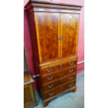 A George III style mahogany cocktail cabinet