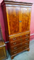 A George III style mahogany cocktail cabinet