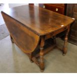 A George III style oak gateleg dining table