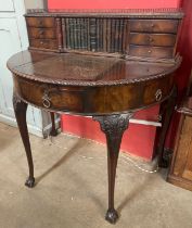 A Regency style mahogany demi-lune bonheur de jour