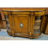 A Victorian inlaid walnut and gilt metal mounted credenza, with Sevres style porcelain oval plaque