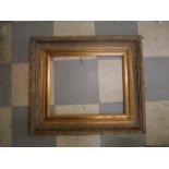 A rectangular gilt frame