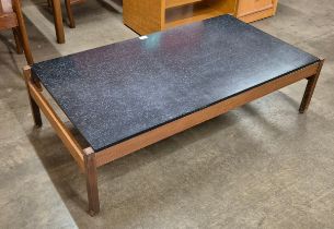 A Guy Rogers teak and black laminate rectangular coffee table