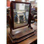 A mahogany toilet mirror