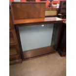 An oak museum display cabinet