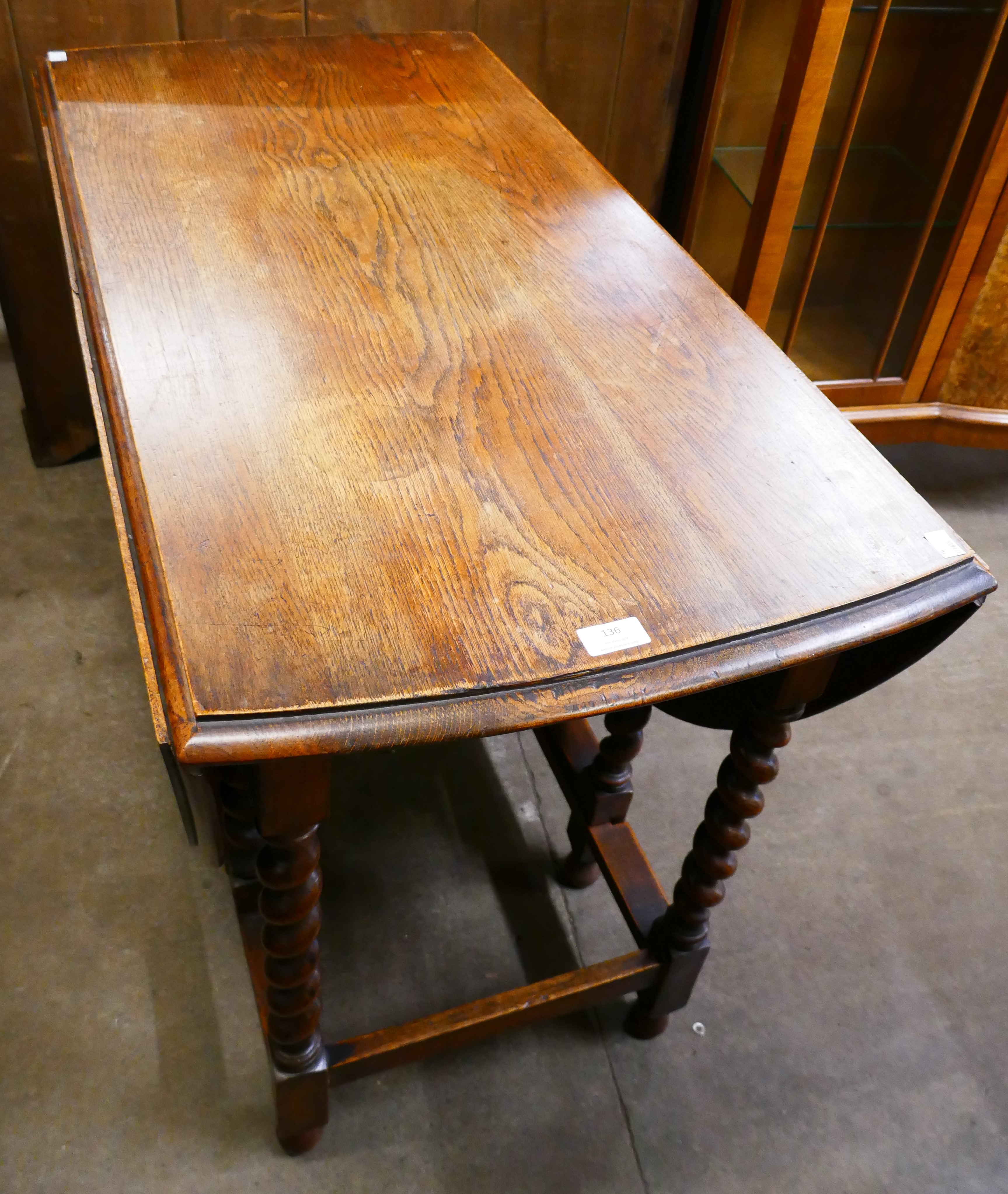 An oak gateleg table