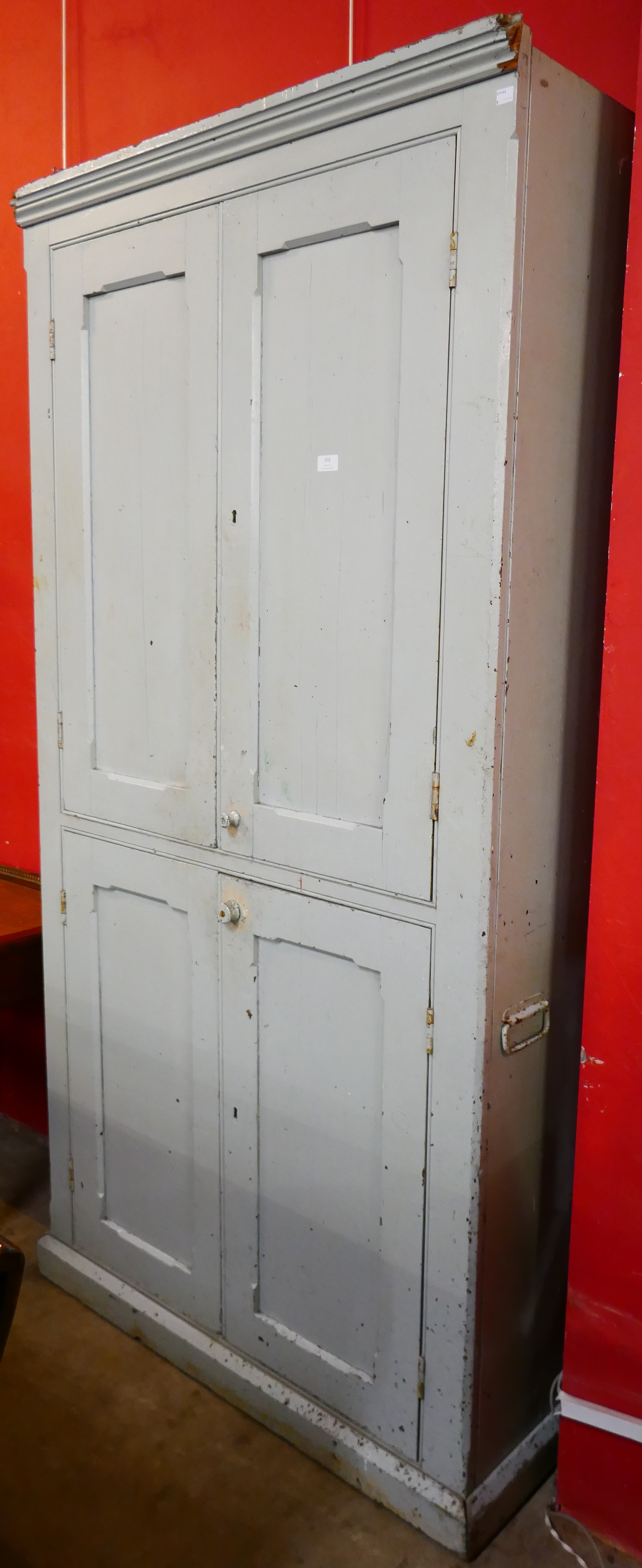 A Victorian painted pine housekeepers cupboard
