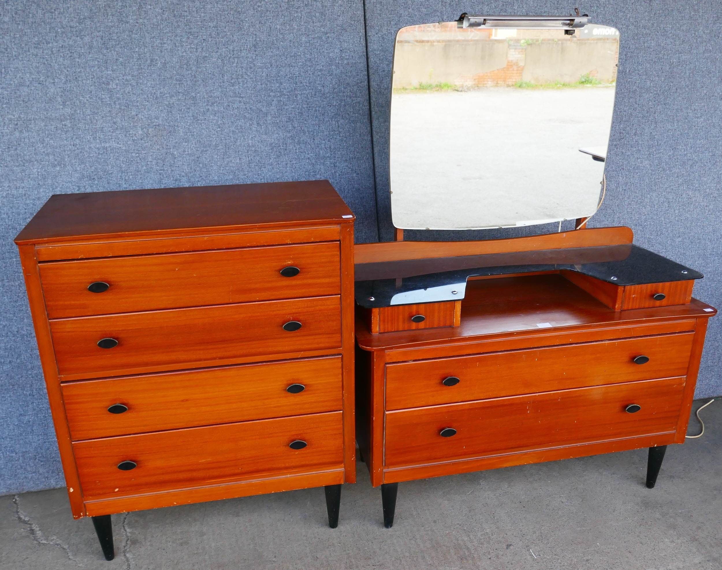 A Lebus teak chest of drawers and dressing table