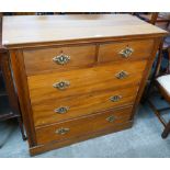 A Victorian walnut chest of drawers