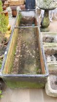 A large galvanised trough