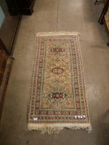 An Eastern cream rug