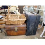 Two travelling trunks and two baskets