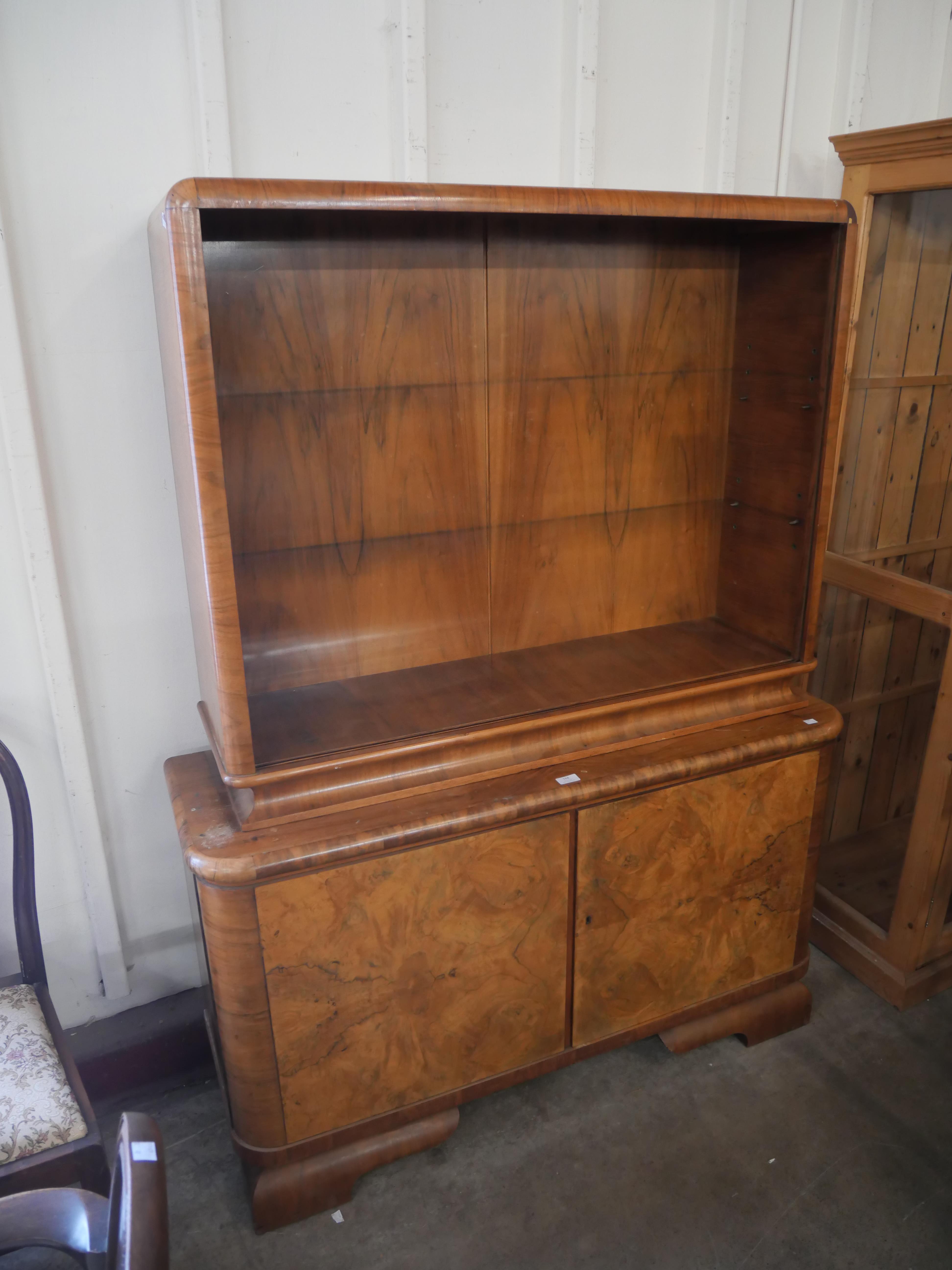 An Art Deco walnut wall cabinet