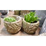 A pair of Tree of Life design concrete planters