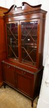 An Edward VII inlaid mahogany bookcase