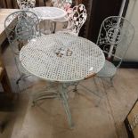 A metal table and chairs