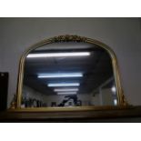 A large gilt framed overmantel mirror