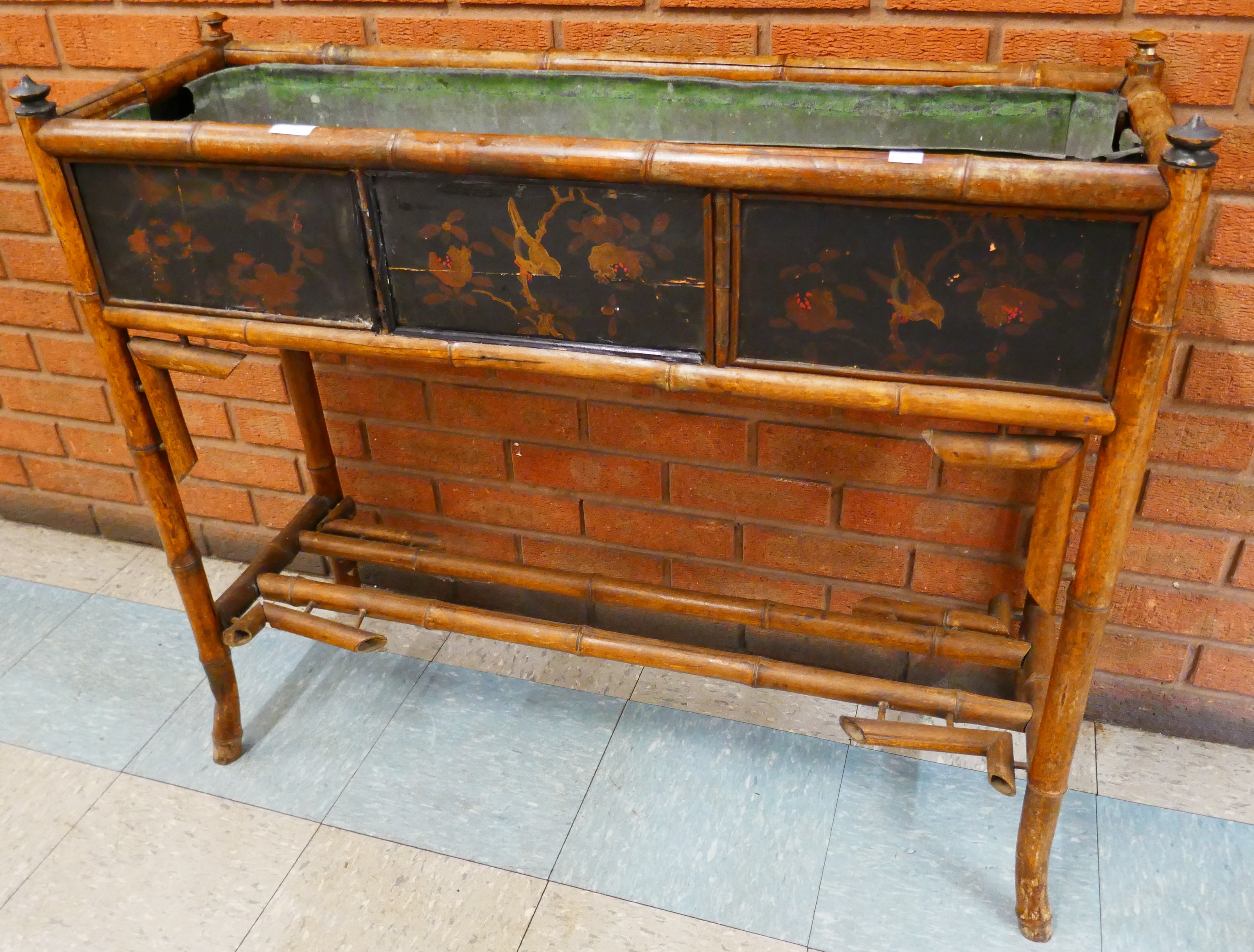 A Victorian bamboo and black chinoiserie lacquered planter