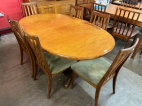 A G-Plan Fresco teak extending dining table and six chairs