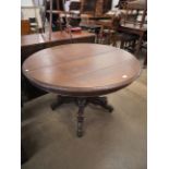 A 19th Century French carved oak circular centre table