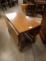 A small oak drop leaf occasional table