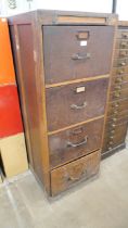 An oak index filing cabinet