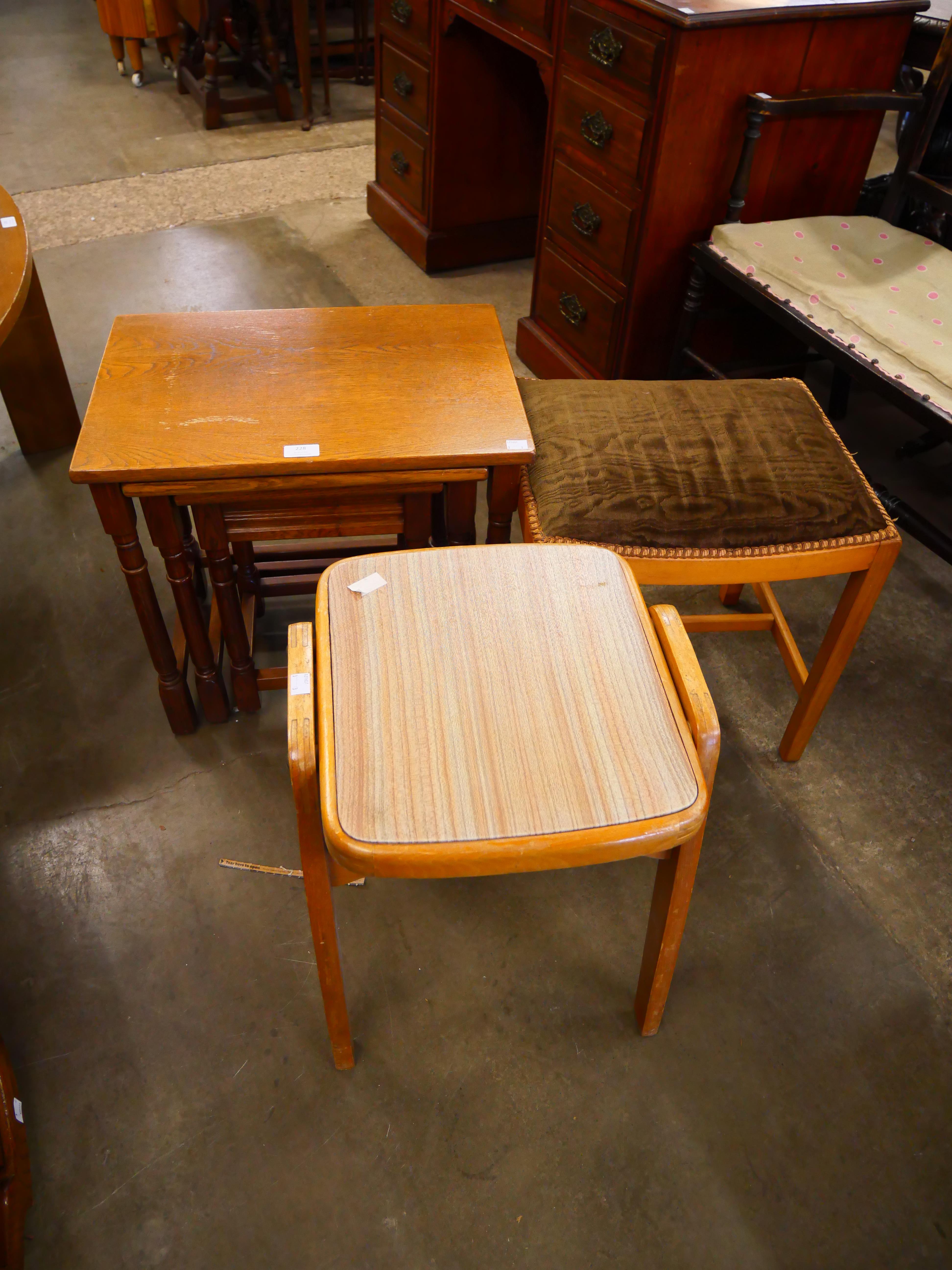 An oak nest of tables and two stools