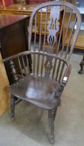 A 19th Century elm and beech highback Windsor chair