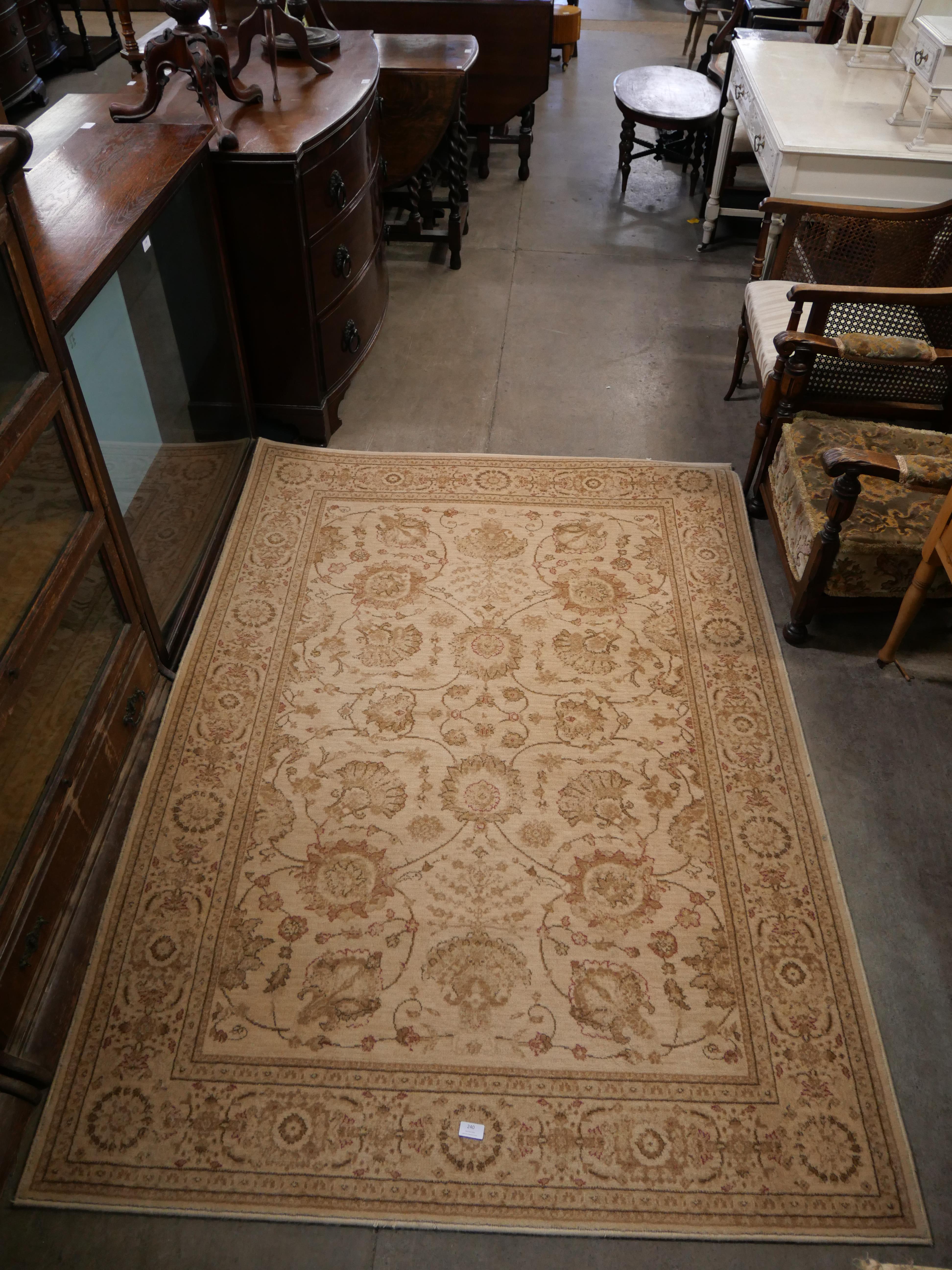 A Royal Keshan cream ground rug