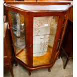 A walnut china cabinet