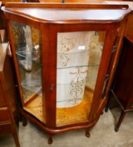 A walnut china cabinet