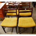 A set of four Jentique tola wood dining chairs