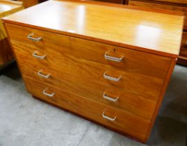 A teak chest of drawers