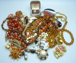 A collection of costume jewellery including gold tone