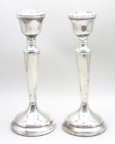 A pair of silver candlesticks, Birmingham marks, 16cm