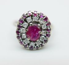 A platinum, ruby and diamond cluster ring, 4.5g, O