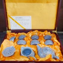 A ten piece Longquan ceramic tea set in wooden presentation box