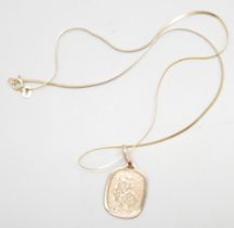 A 9ct gold St. Christopher on a 9ct gold chain, 2.7g, chain 37cm