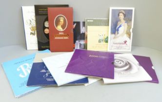 A collection of coin packs; seven £5, four £2, Shield of Arms pack, 1981 Royal Wedding crown pack