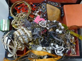 A jewellery box and costume jewellery, and two cased travel clocks