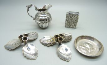 A small imported 925 silver jug, an 830 silver dish, a vesta case and a pair of candle holders