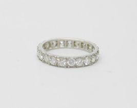 A platinum and diamond eternity ring, 3g, L, (marked plat on side)