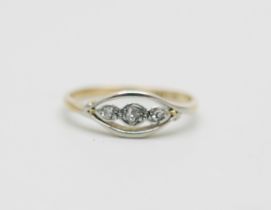 An Art Deco 18ct gold, platinum set three stone diamond ring, 2.4g, Q