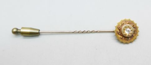 A c1900 diamond set stick pin, 2.6g, top 15mm diameter