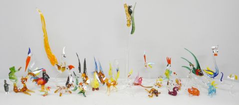 A collection of approximately 30 glass animals