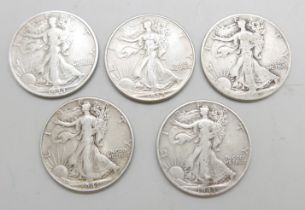 Six US half-dollar coins, 74.2g