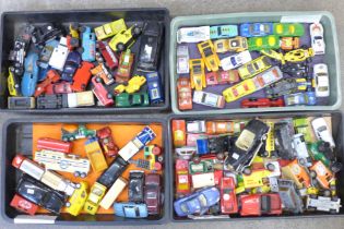 A collection of die-cast model vehicles, playworn