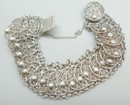 A fancy continental filigree silver bracelet with French control marks, 27g