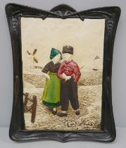 An Art Nouveau Dutch scene Bretby plaque, 26.5cm x 21cm