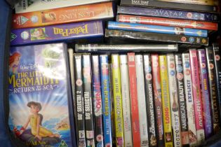 A large collection of DVDs, VHS including Disney, comedy, etc.